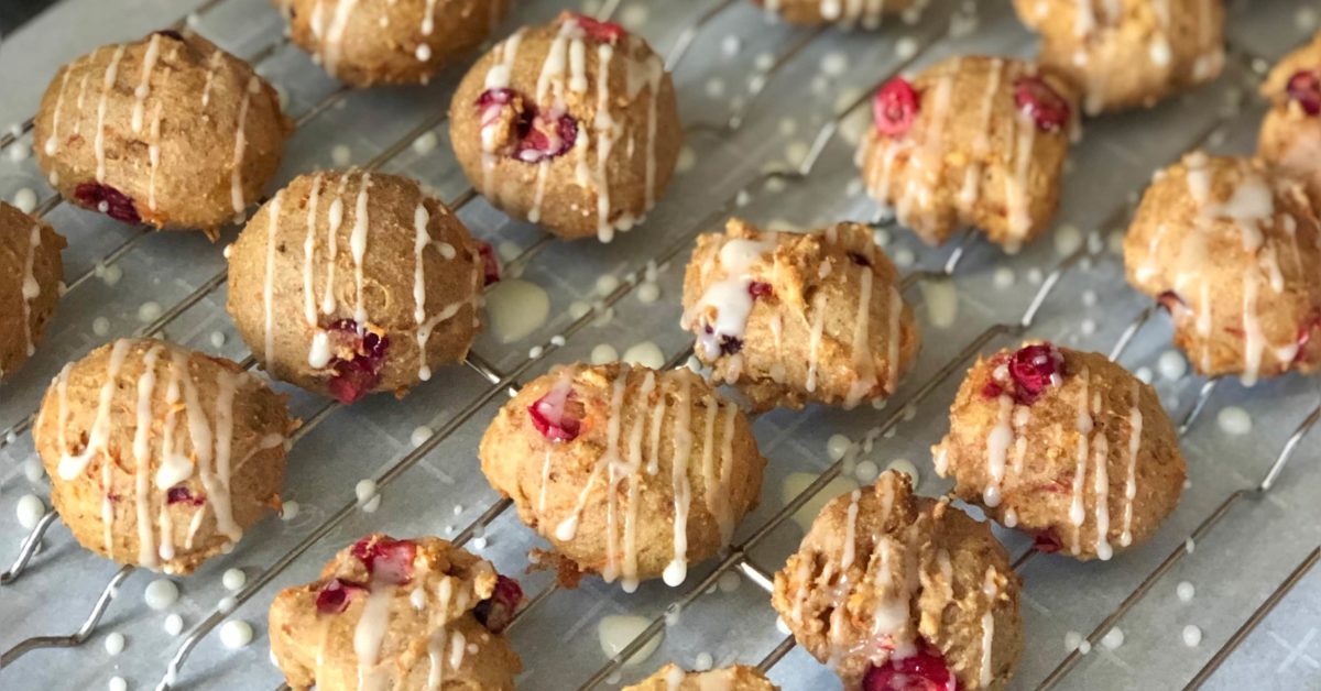 This healthy cranberry orange carrot cookies recipe features fresh cranberries, whole grain flour, carrots, and a delicious glaze on top