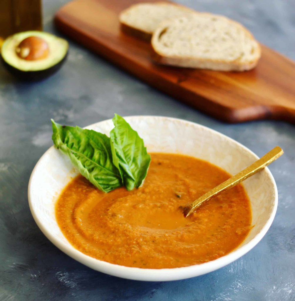 This roasted tomato basil soup calls for tomatoes of your choice so you can use your favorite tomato variety or throw in any canned whole tomatoes you have on hand. Serve with avocado slices, nutritional yeast, and whole grain bread if desired. #tomatoes #vegansoup #comfort food #CheerfulChoices