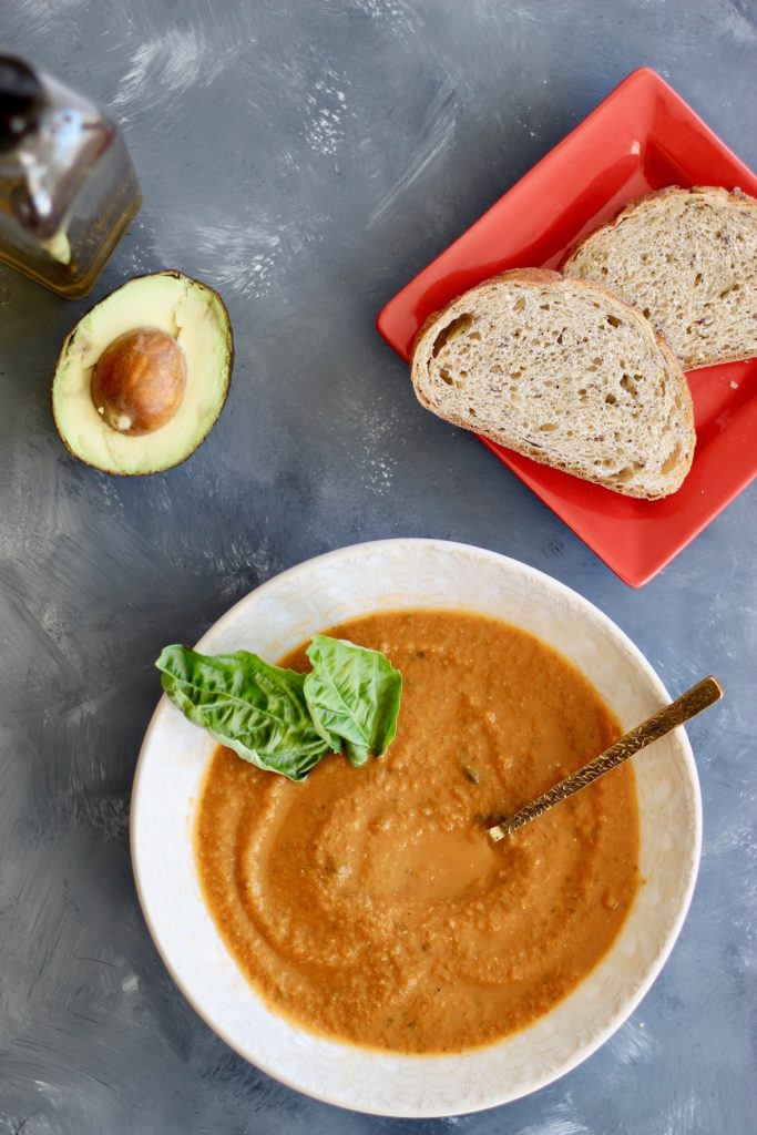 This roasted tomato basil soup calls for tomatoes of your choice so you can use your favorite tomato variety or throw in any canned whole tomatoes you have on hand. Serve with avocado slices, nutritional yeast, and whole grain bread if desired. #tomatoes #vegansoup #comfort food #CheerfulChoices