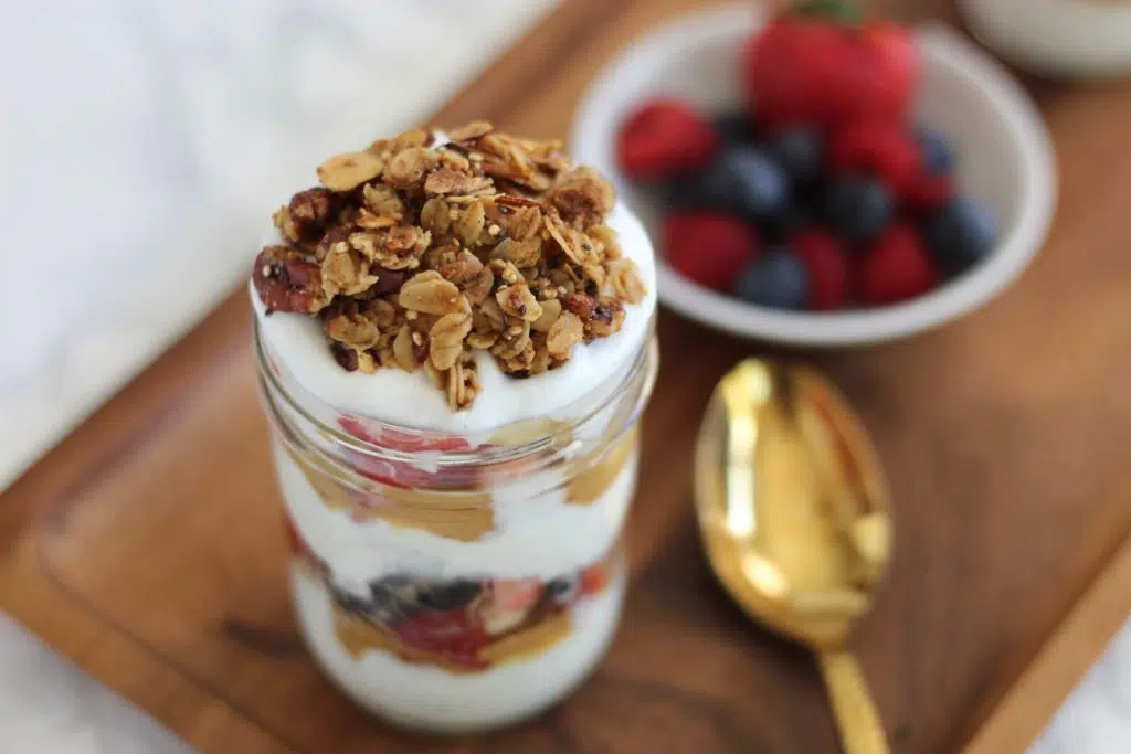 Throw this yogurt parfait together in 5 minutes or less. Completely customizable, protein-packed, and meal prep friendly.
