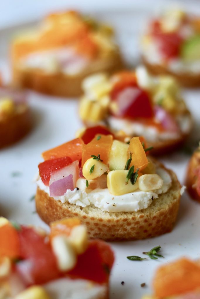 This Farmers Market Vegetable Bruschetta is the perfect party appetizer, side dish, or colorful meal. Customize it your way to make it gluten-free, dairy-free, or vegan! #seasonal #summerveggies #bruschetta #farmersmarket #CheerfulChoices