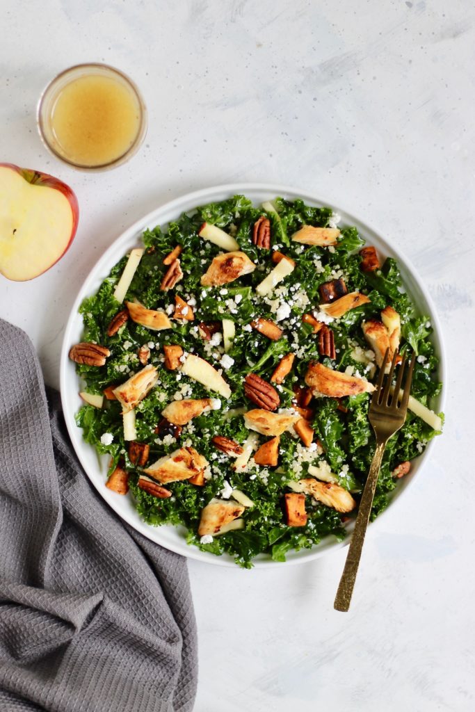 This massaged kale salad is the perfect, protein-packed dish. Featuring fall produce of your choice so you can customize with your favorites. Add this recipe to your meal prep routine, holiday table, or party platter! #FallProduce #MassagedKale #HealthySalad #CheerfulChoices 