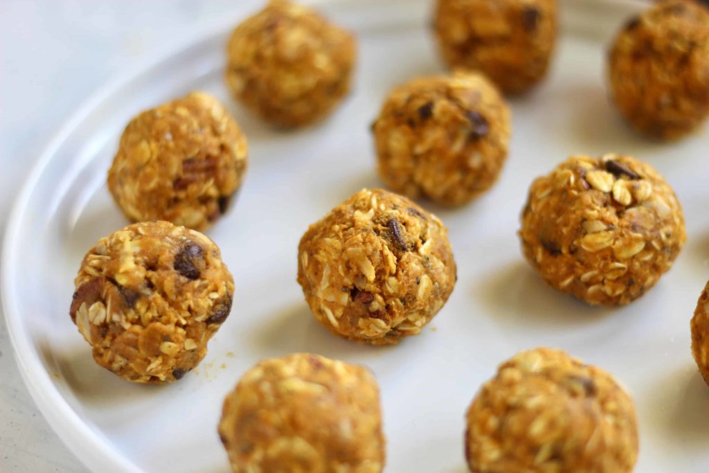 Close up of rolled oats, chocolate chips, and pumpkin