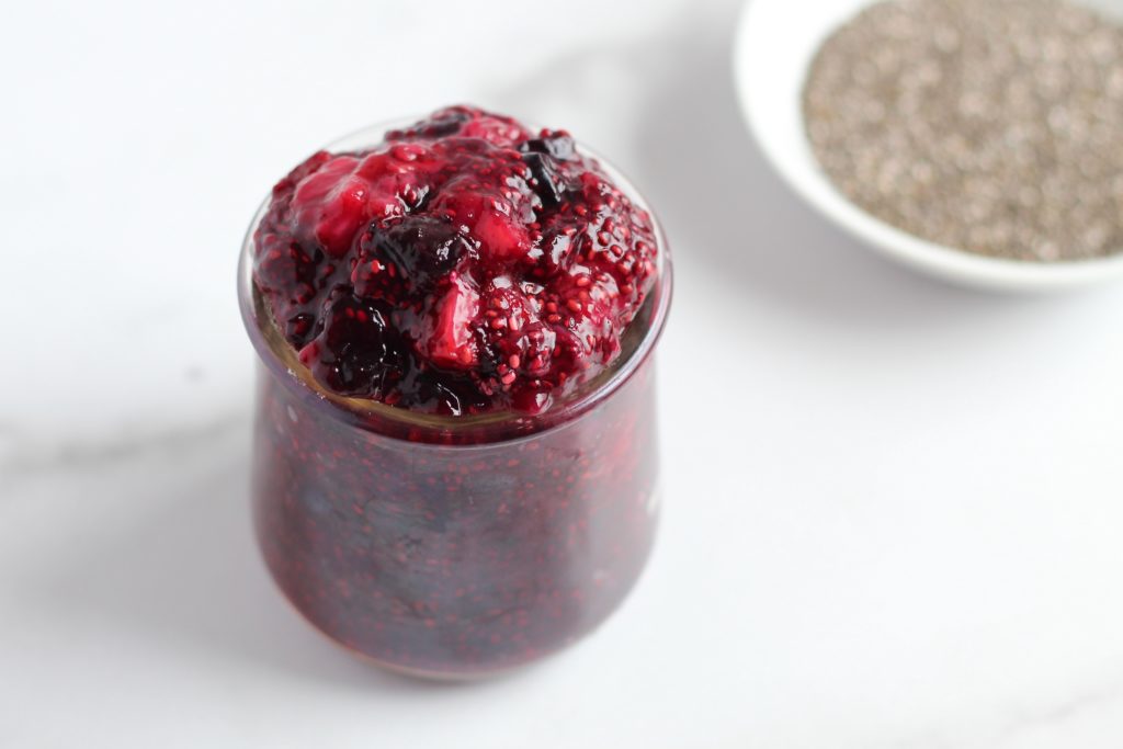 This Customizable Chia Seed Jam is a great way to use up any fresh or frozen fruit on hand. This recipe calls for just 2 ingredients and takes less than 5 minutes to make. Plus, it’s naturally gluten-free, vegan, and has no added sugars! #homemadejam #frozenfoods #easyrecipe #2ingredients
