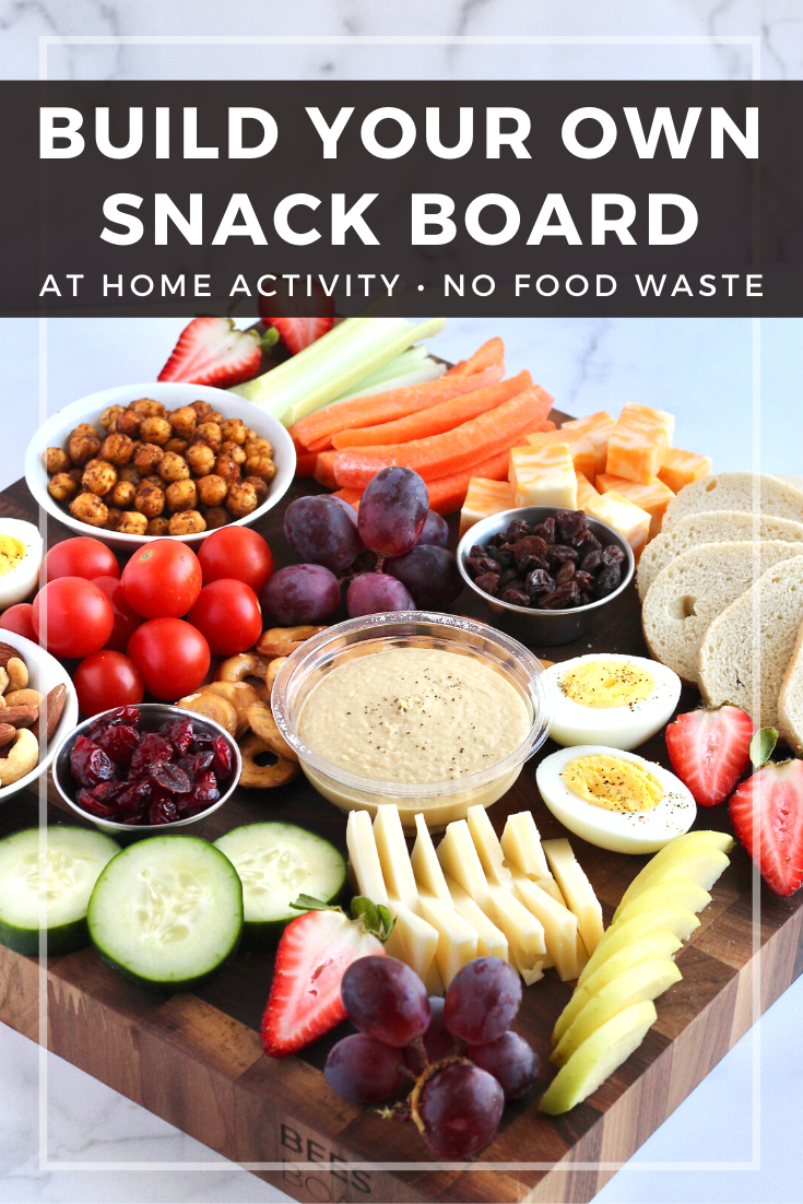 Learn how to make a picture-worthy snack board with whatever bits of food you have in your fridge or pantry. It's a fun at home activity and a great way to reduce food waste! #athomeactivity #snackboard #charcuterie #nofoodwaste #vegetarian