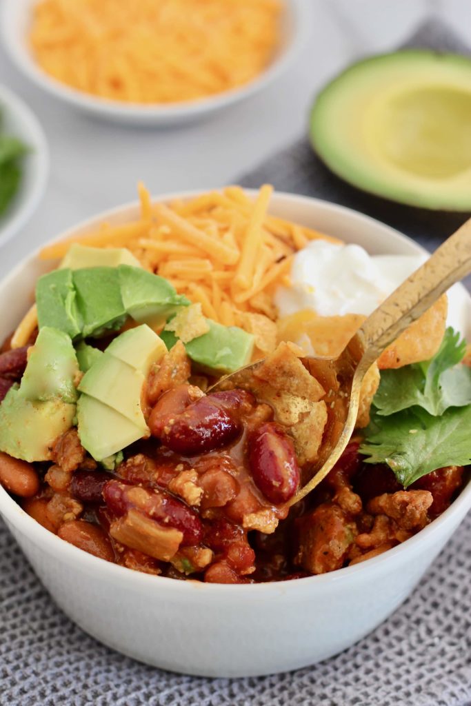 In this Customizable Chili Recipe Template you get to choose your favorite meat, vegetables, beans, and toppings. You can meal prep this chili ahead of time too! #Chili #RecipeTemplate #Customize #GlutenFree #OnePot #MealPrep #Crockpot