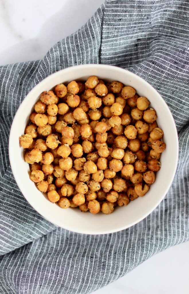 Close up of roasted chickpeas in a white bowl
