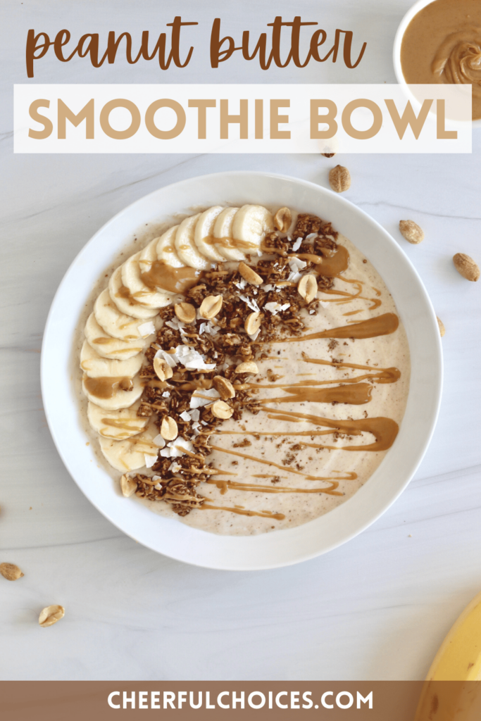 This peanut butter smoothie bowl is filled with frozen bananas, peanut butter, and lots of crunchy toppings! Packed with 20 grams of protein. #SmoothieBowl #PBLover #EasyBreakfast