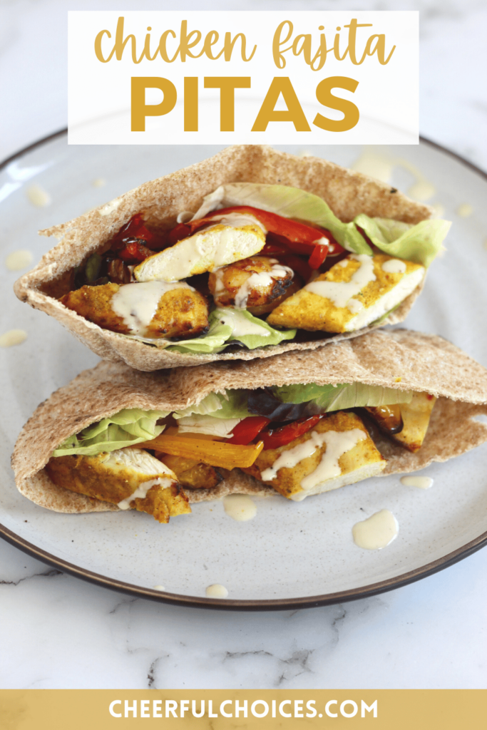 These protein-packed pitas are filled with with roasted bell peppers, yogurt marinated chicken, and tahini sauce! A flavorful spin on classic fajitas. 
