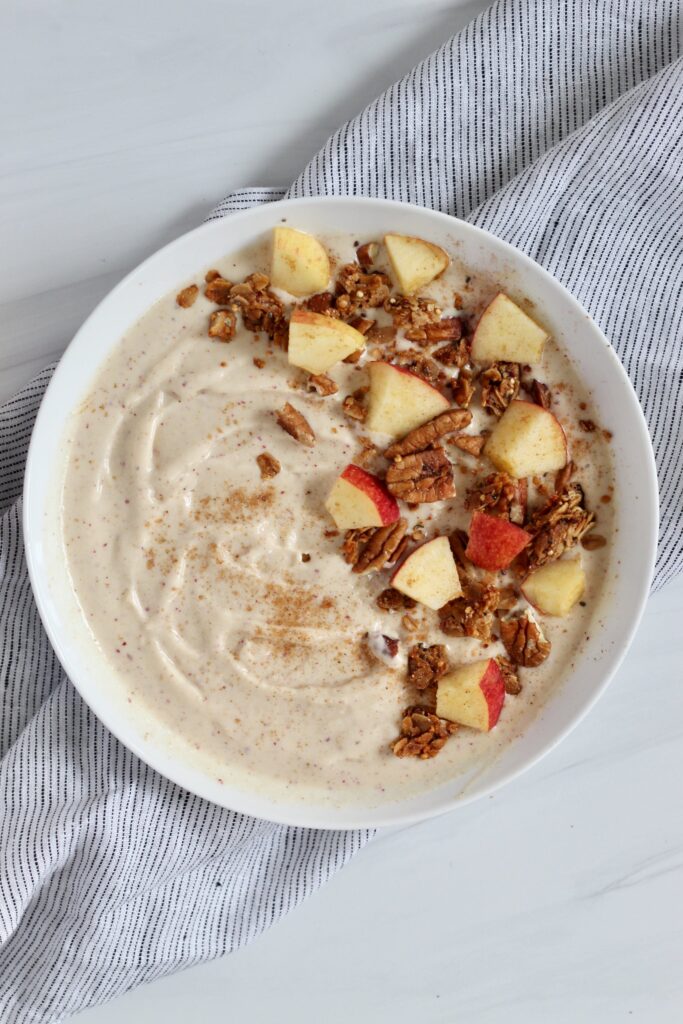 Apple smoothie bowl in a white bowl
