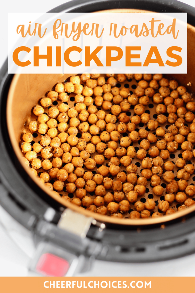 Close up of air fried chickpeas in an air fryer basket from cheerfulchoices.com