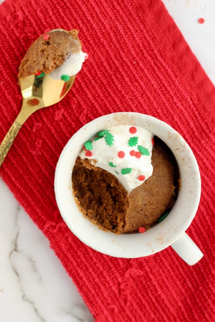 Spoon full of gingerbread in a mug
