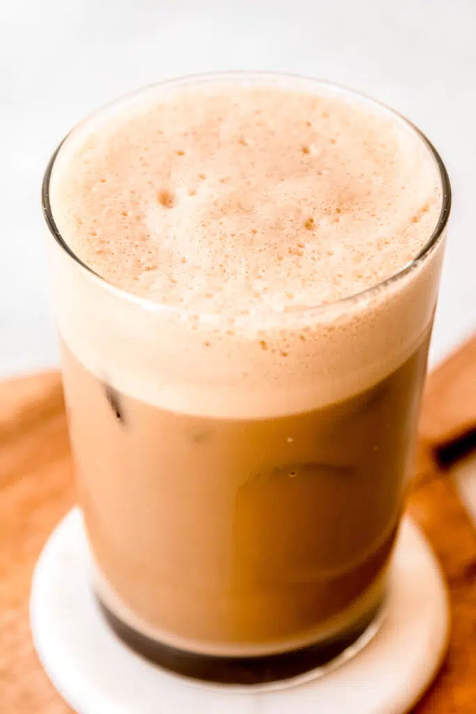 Close up of iced coffee with foam on top