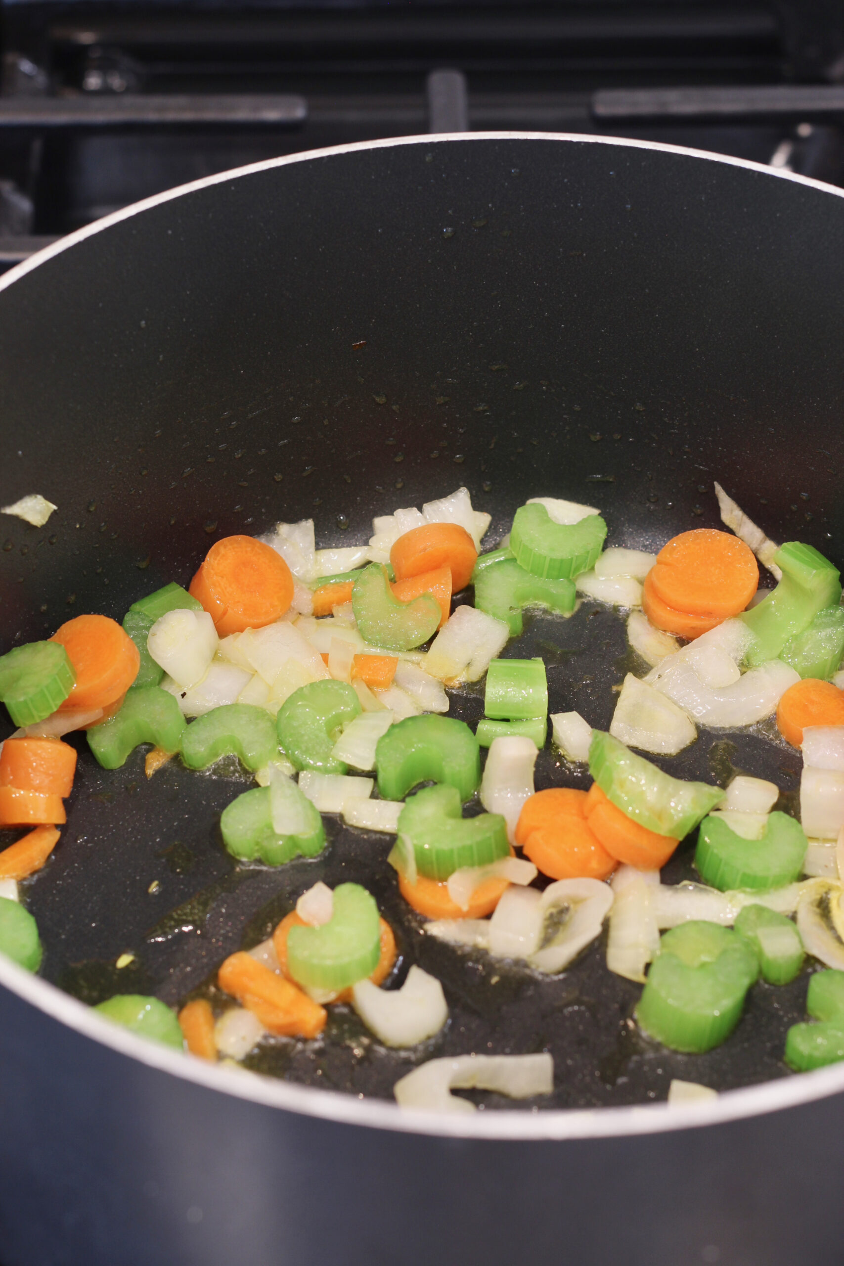 Celery, onion, and carrots cooking