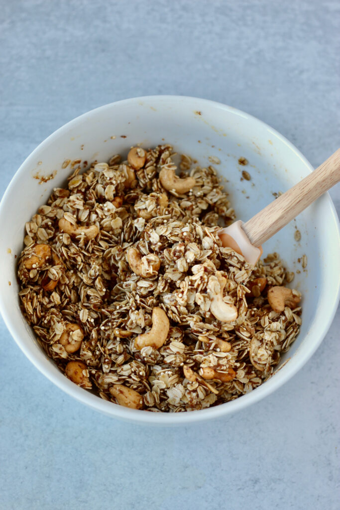 Mixing granola in a bowl