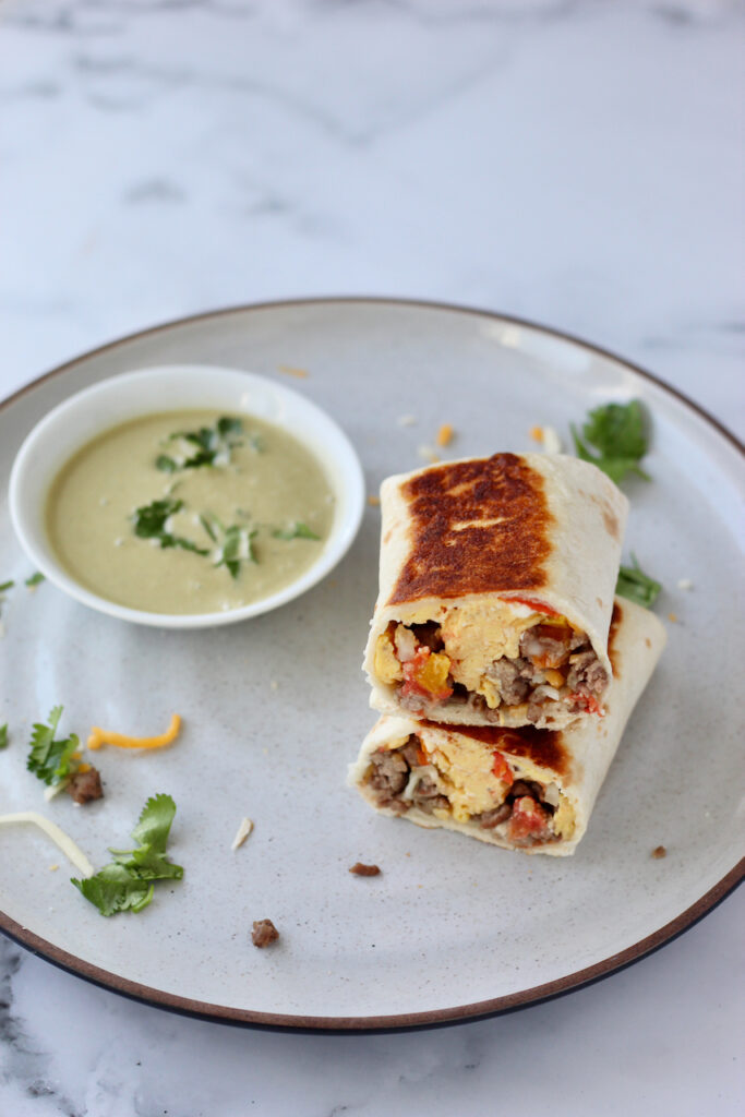 burritos stacked on plate