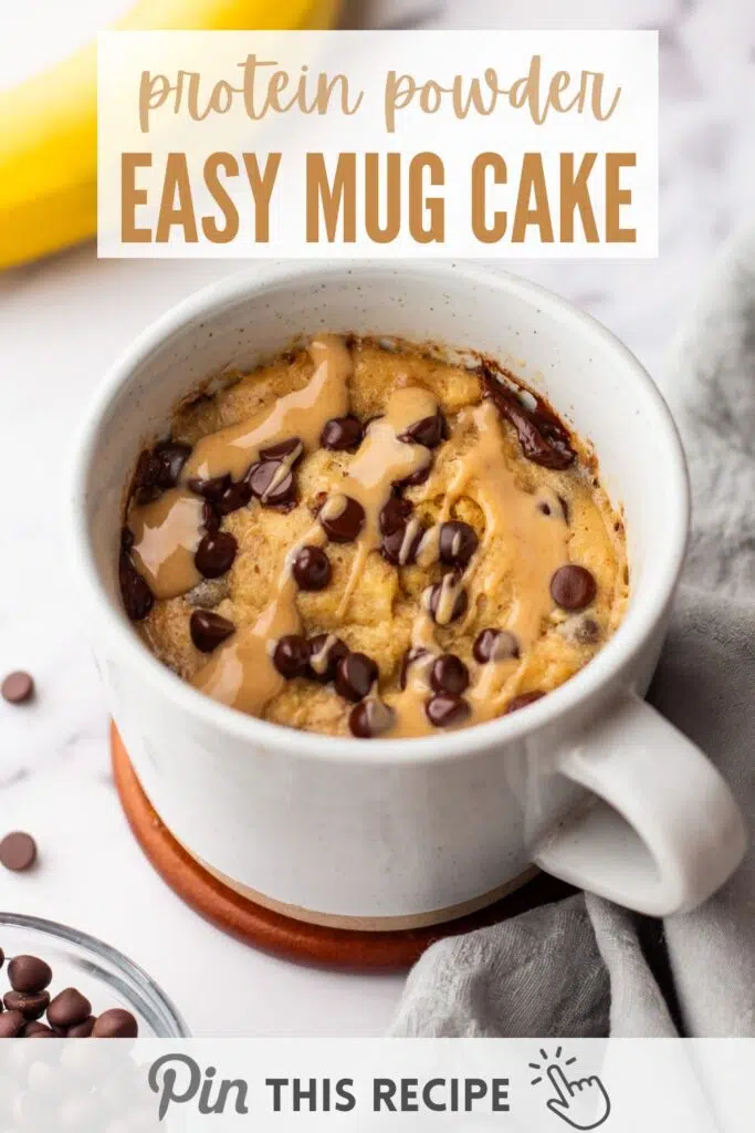 A drizzle of peanut butter on a freshly baked chocolate protein mug cake. An easy microwave protein cake recipe that’s perfect for a protein-rich snack or dessert.