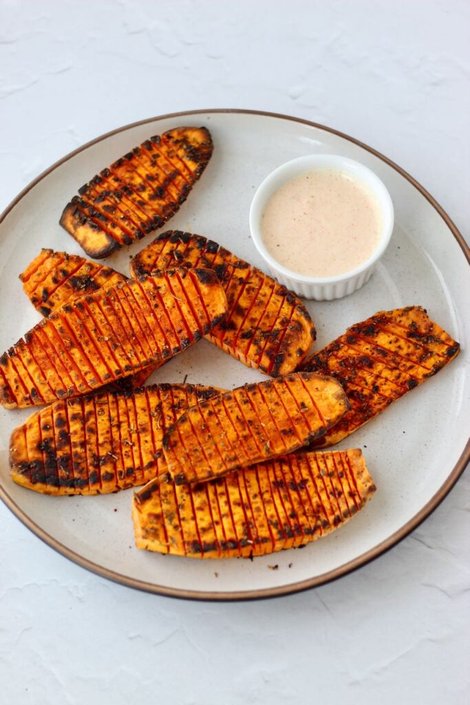 Golden brown sweet potato slices, served with light mayo aioli.