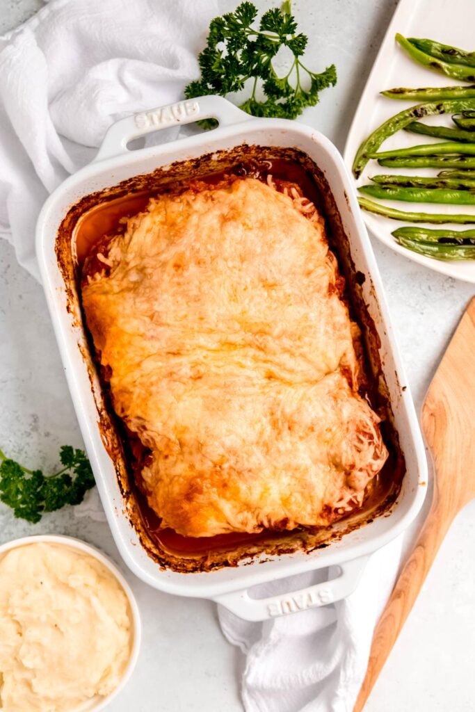 Hearty Italian Meatloaf in a ceramic dish, perfect for a comforting family meal.