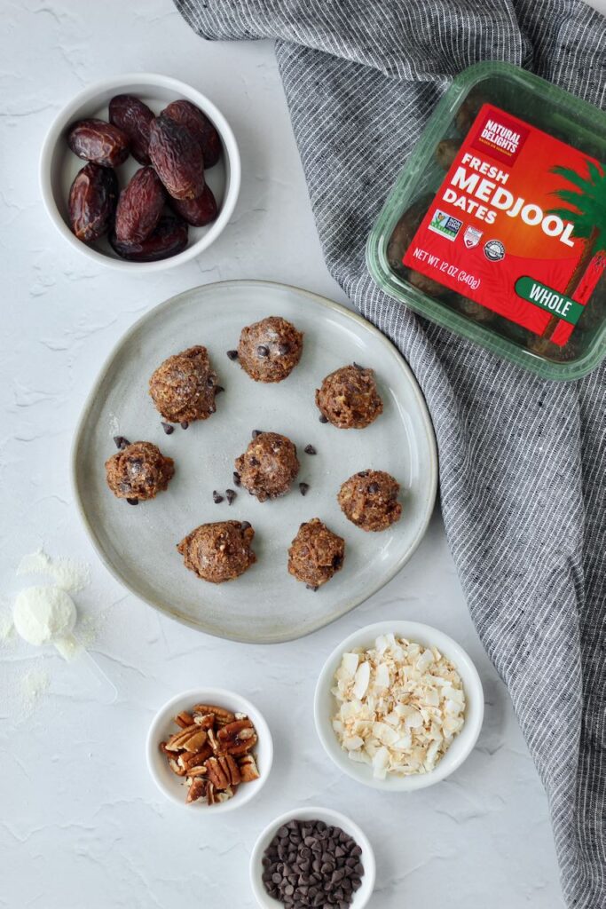Rolled protein dough bites, a portable and healthy snack option, made with Medjool dates