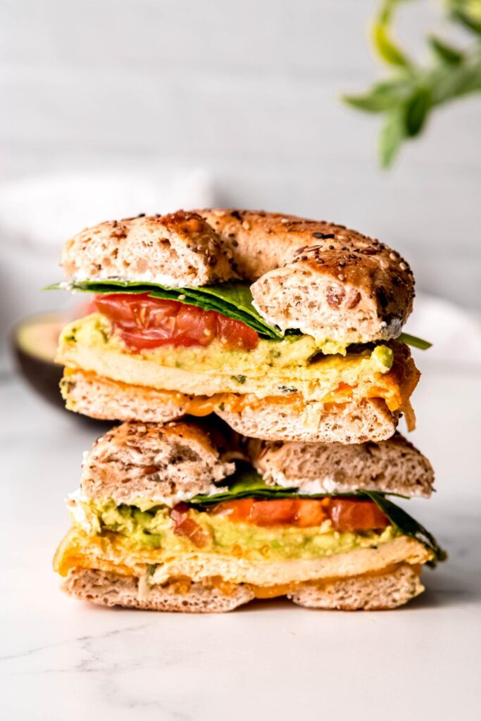 Easy Bagel Breakfast Sandwich stacked on a plate