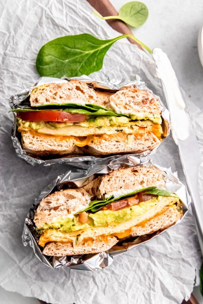 Close up this easy bagel breakfast sandwich assembled and wrapped in foil