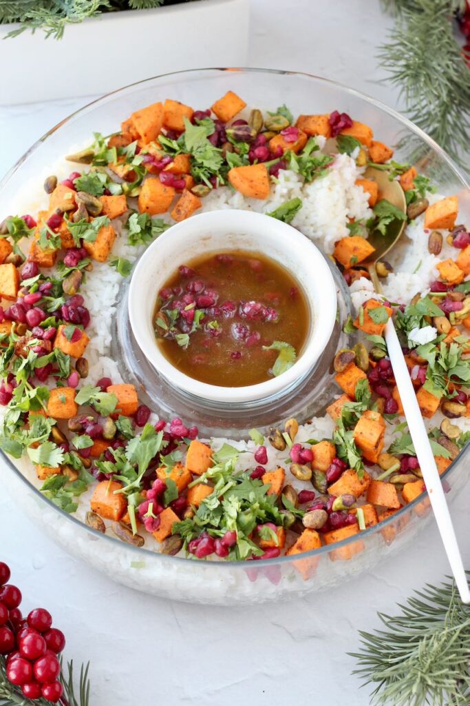 Christmas rice with sweet potatoes, pistachios, and pomegranate seeds.