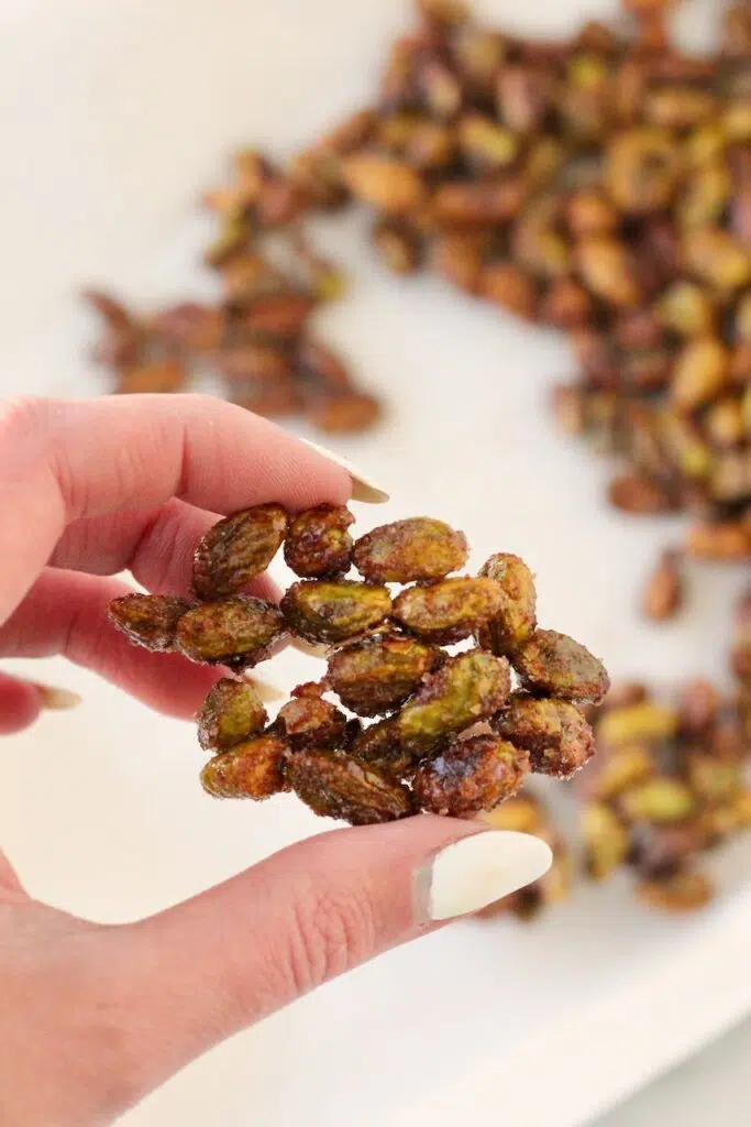 Cooled honey roasted pistachios with crystallized coating.