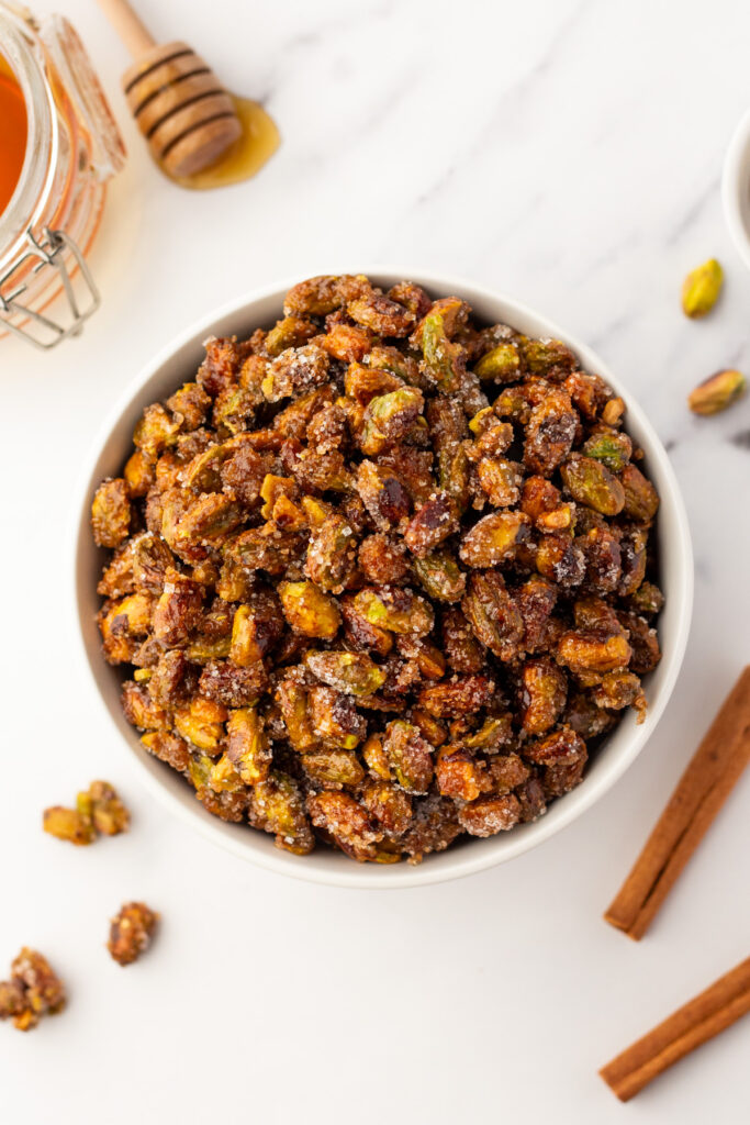 Air fryer honey roasted pistachios in white bowl