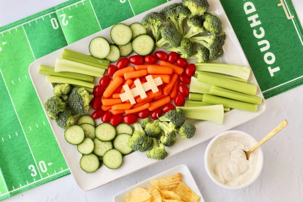 Football-themed veggie platter with broccoli, celery, and carrots