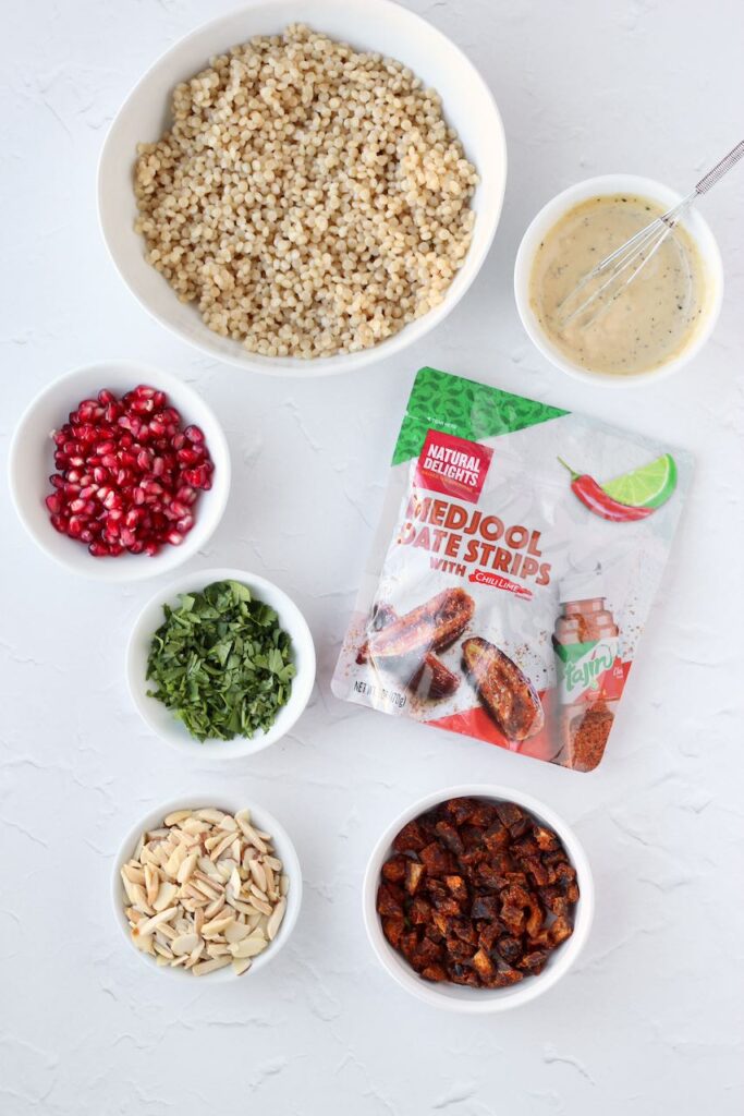 Ingredients laid out for couscous salad