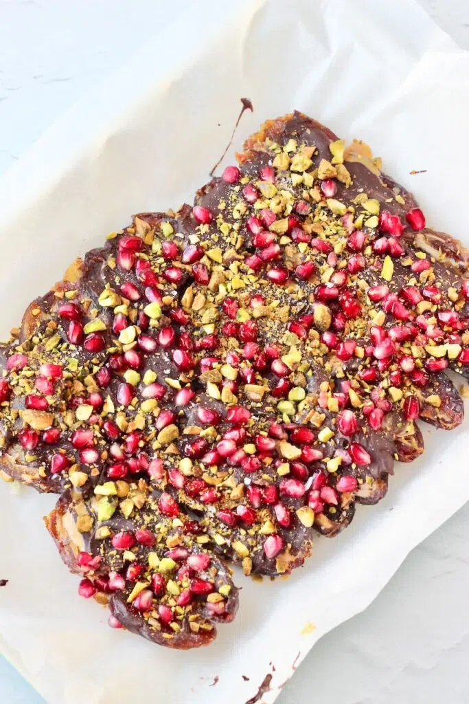 finished Holiday Date Bark with pomegranate seeds and pistachios