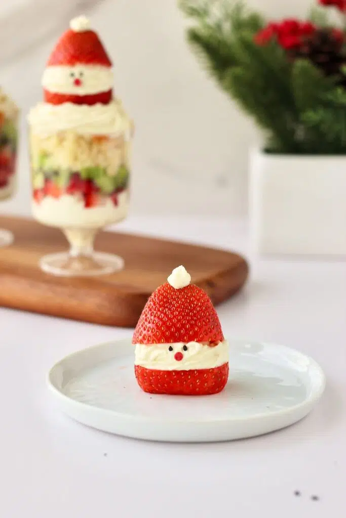 Strawberry Santa hat with Individual Christmas Trifles in background