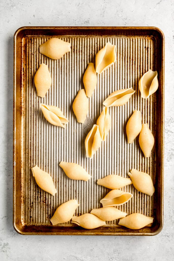 Cooked shells cooling on baking sheet