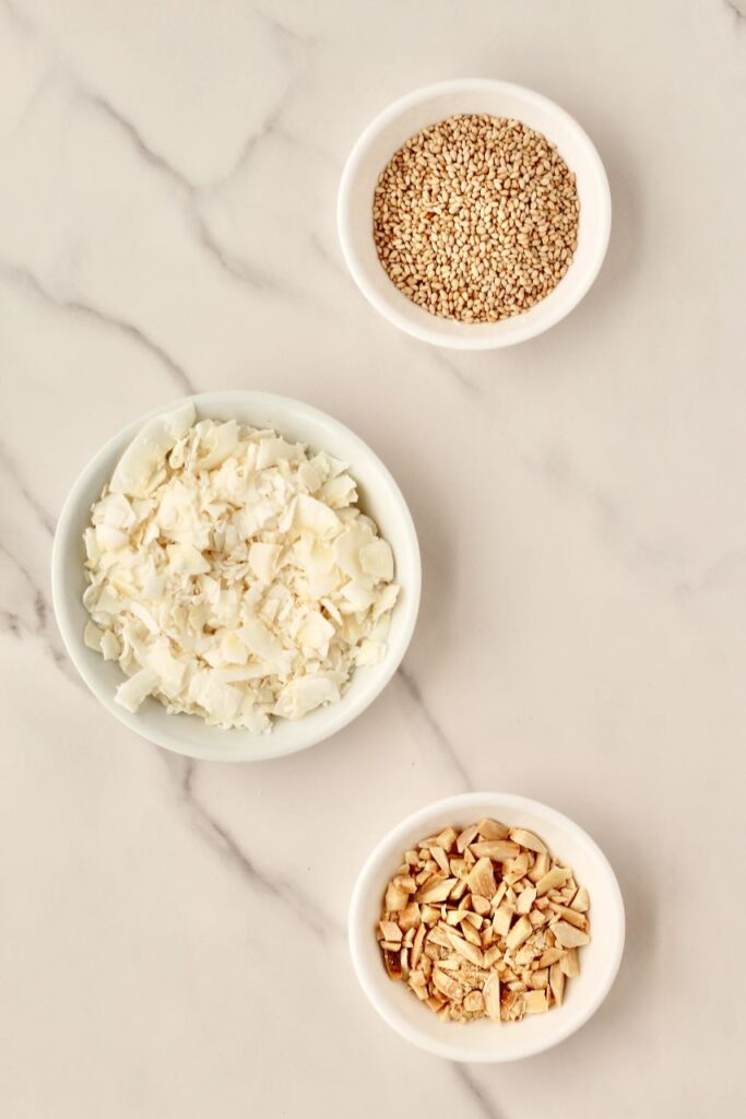 Toppings of your choices in white bowls