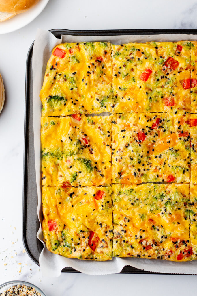 Customizable sheet pan eggs cut into squares.