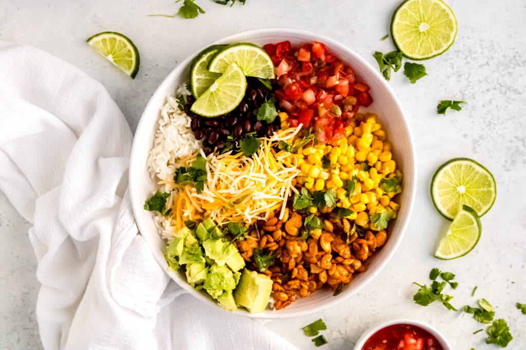 Tempeh burrito bowl with lime slices