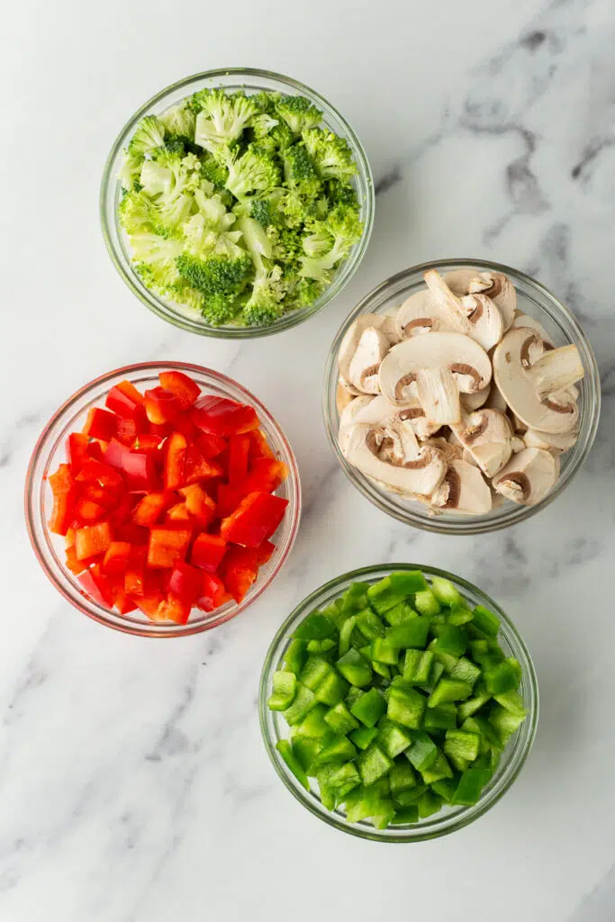 Vegetables of your choice: broccoli, mushrooms, red peppers, and green peppers.