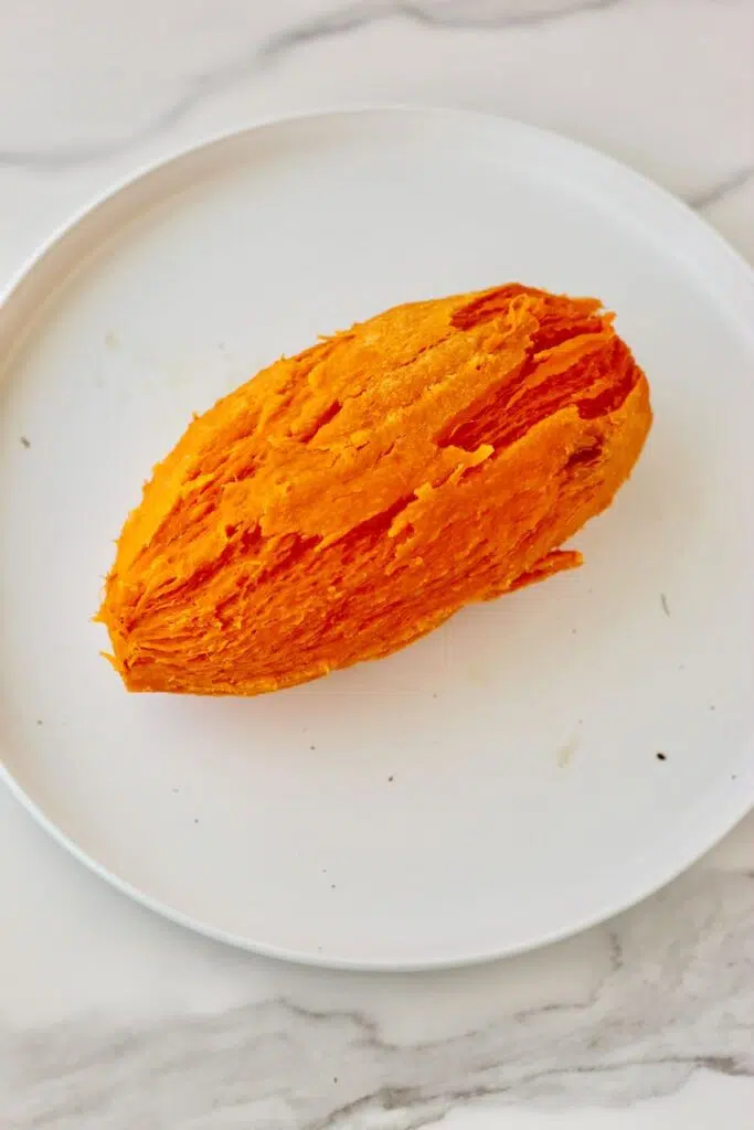 baked sweet potato on white plate without skin