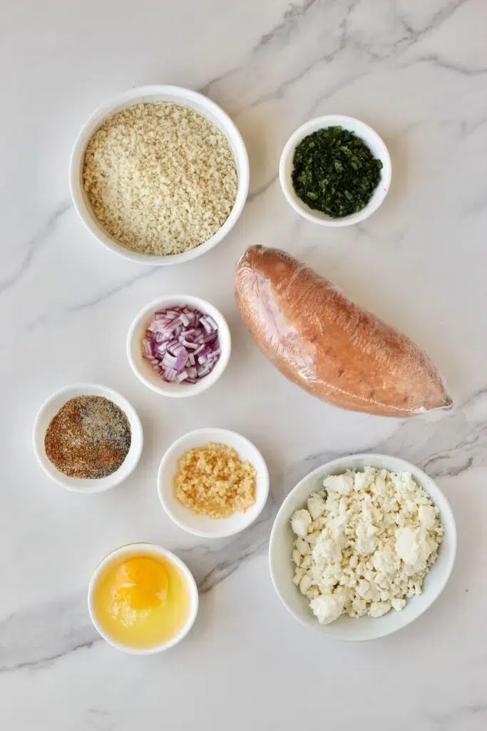 Ingredients to make sweet potato patties and feta dip in separate white bowls