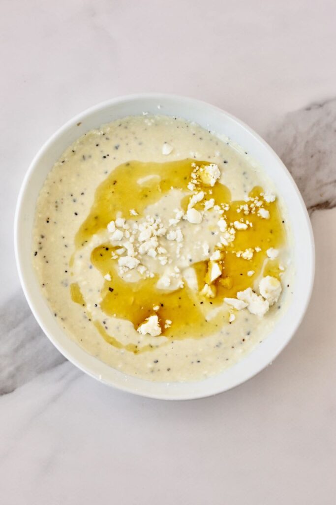 Whipped feta dip in white bowl