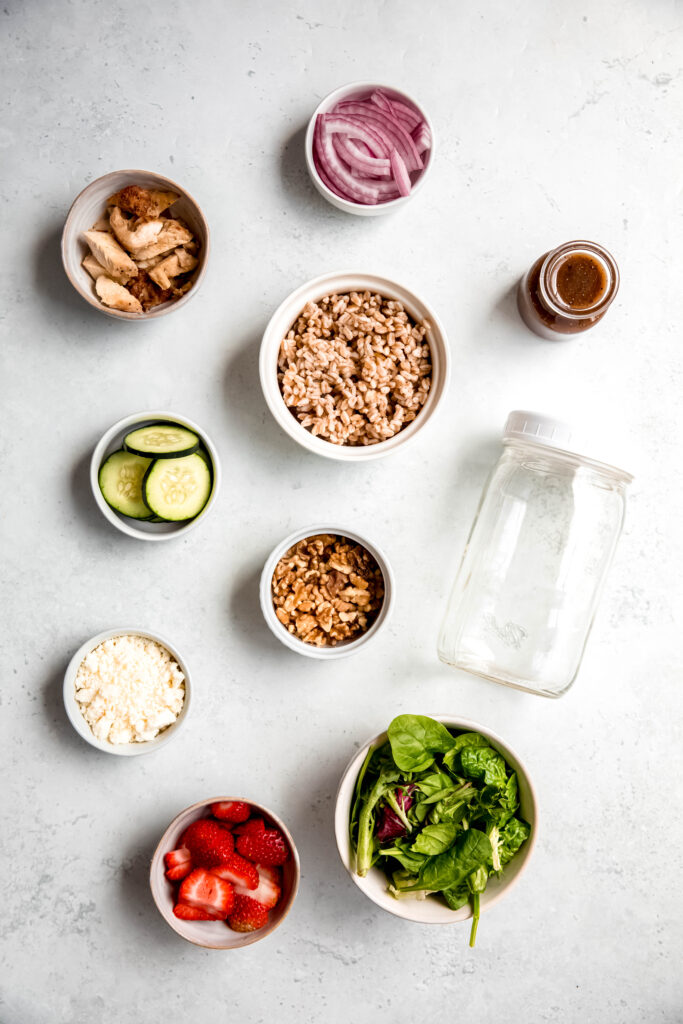 Ingredients for berry goat cheese salad laid out