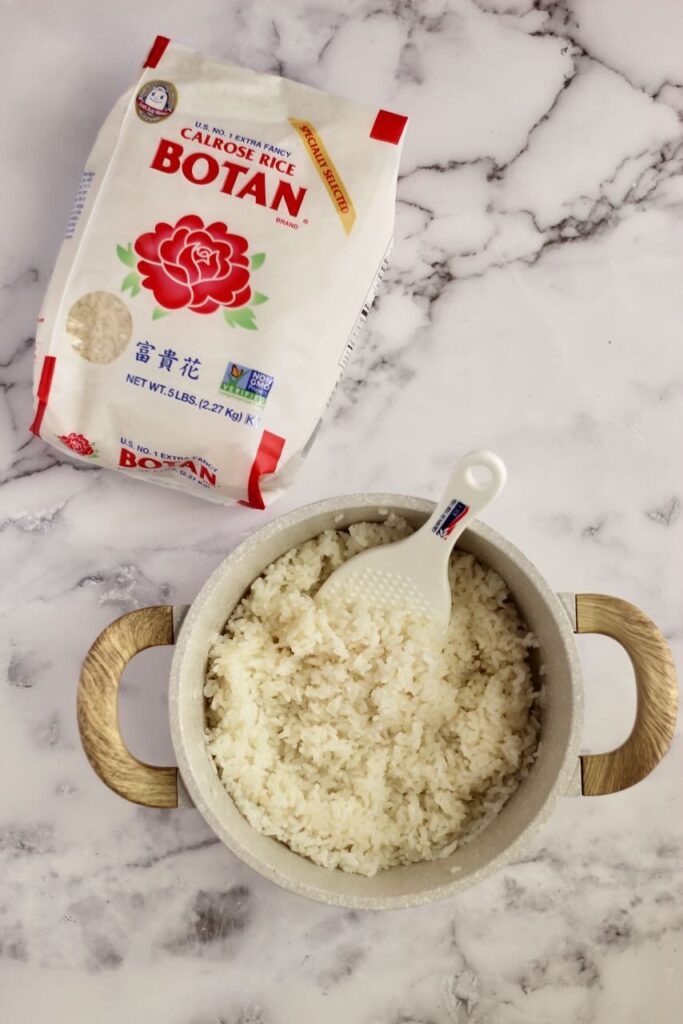 Calrose rice in pot with rice in bag