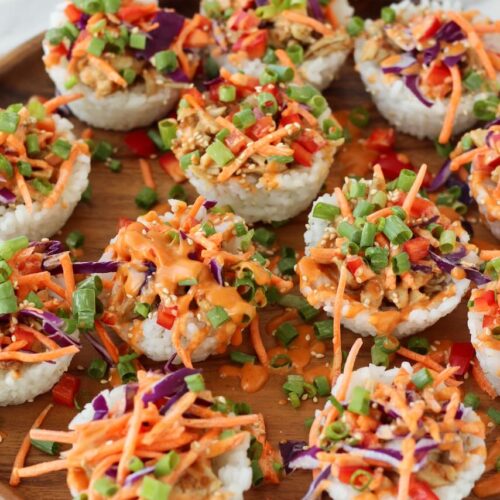 Korean BBQ Chicken Rice Cups on wood serving plate