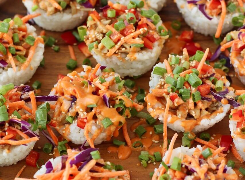 Korean BBQ Chicken Rice Cups on wood serving plate