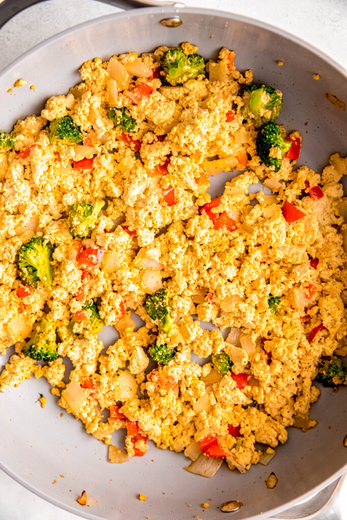 Tofu scramble with veggies in skillet