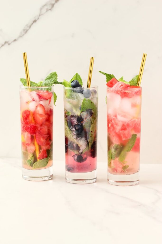 Customizable fruit mojitos done 3 ways - strawberry, blueberry, and watermelon