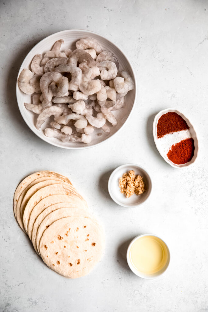 Ingredients laid out for shrimp tacos