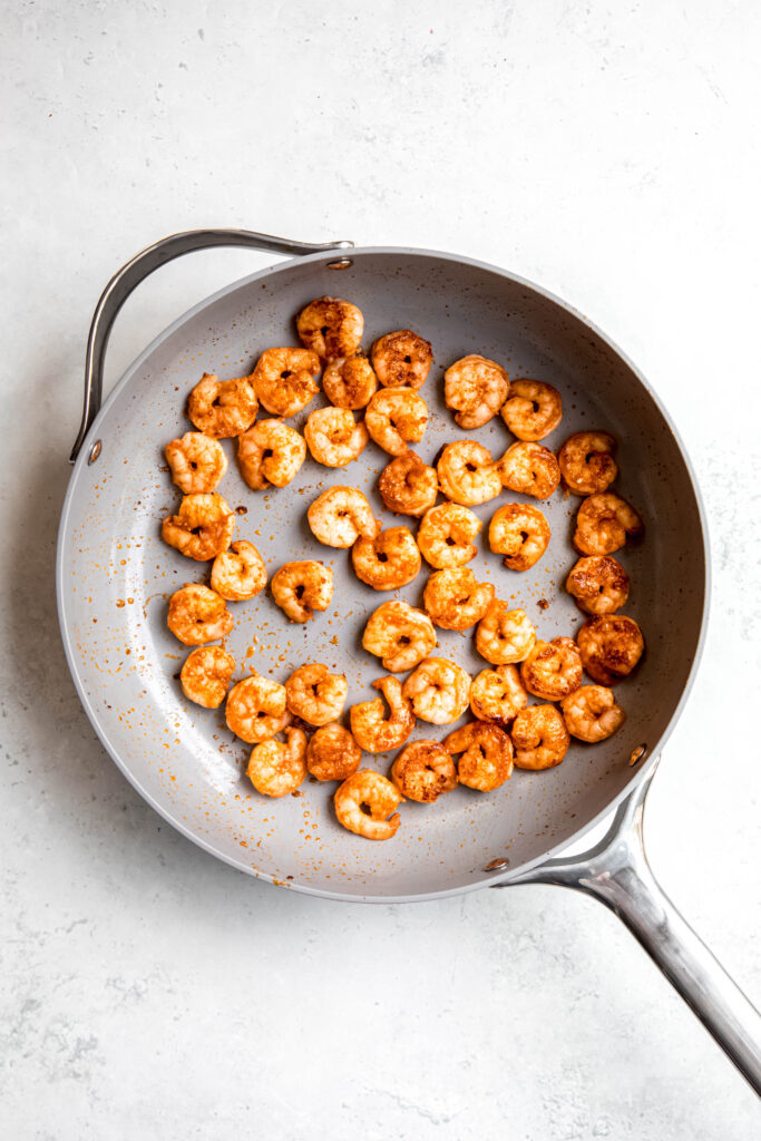 Shrimp cooking in skillet