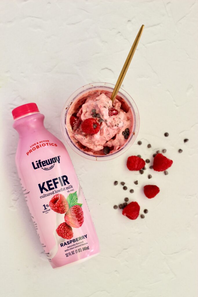Raspberry Dark Chocolate Lifeway Kefir Protein Ice Cream in pint and Lifeway Kefir bottle